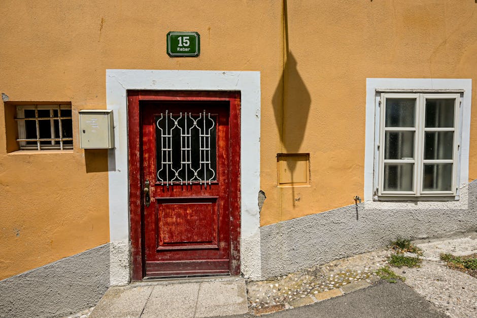 A classic red door with the number 15