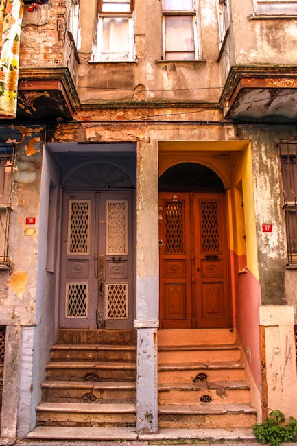 Two distinct wooden doors side by side